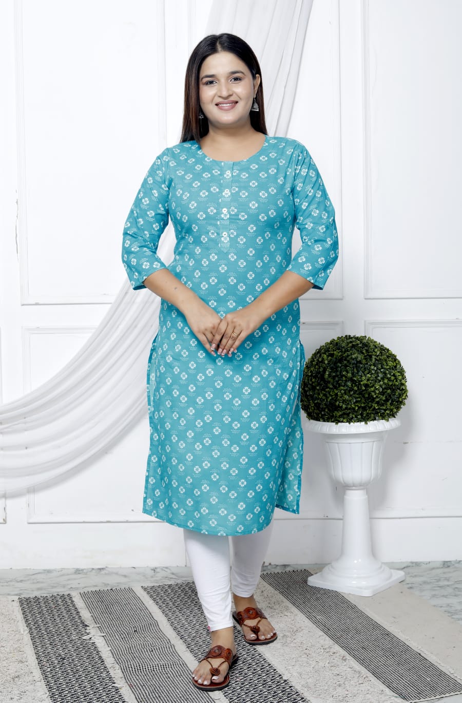 Turquoise Straight Cotton Kurta with White Prints and Side Pockets