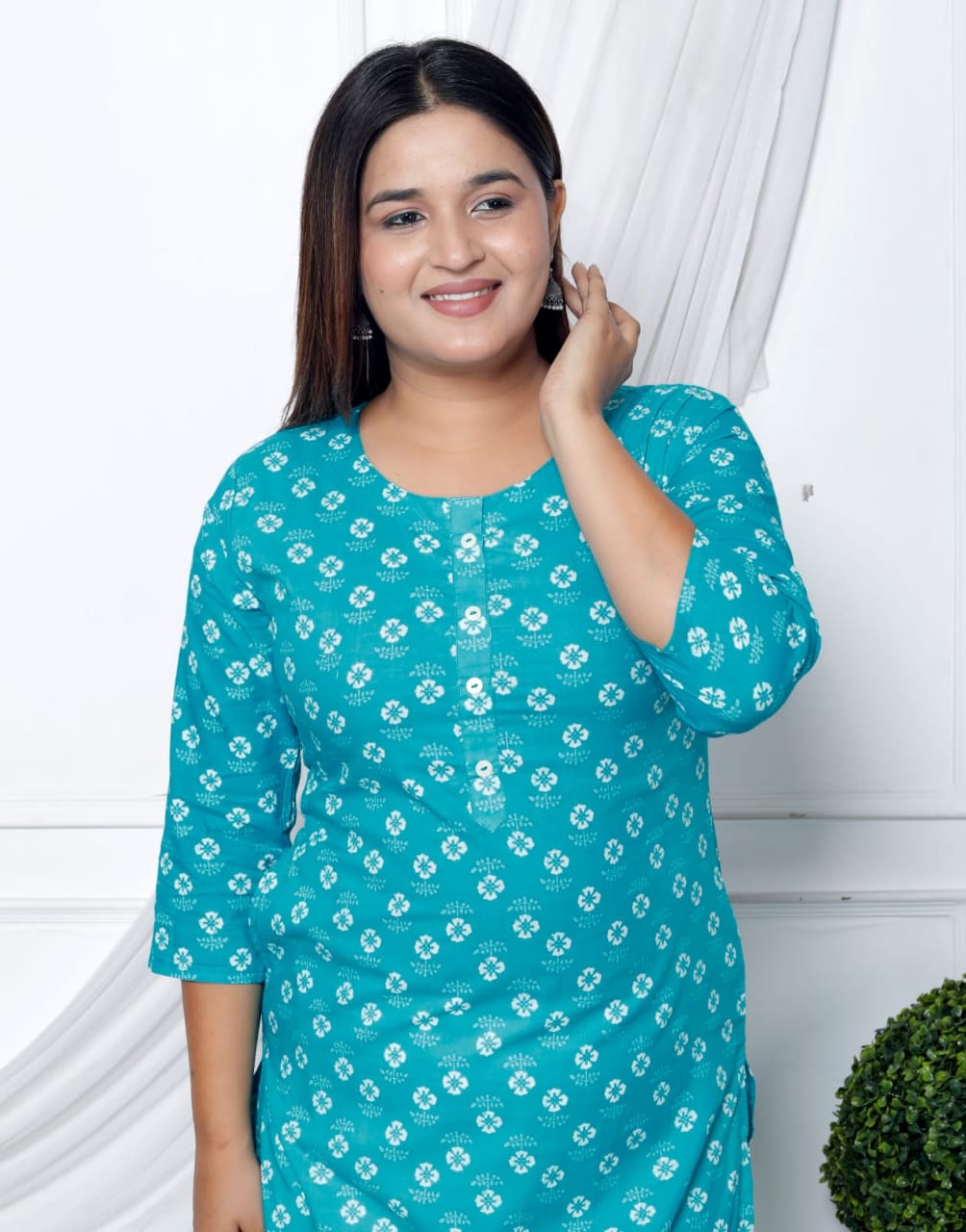 Turquoise Straight Cotton Kurta with White Prints and Side Pockets