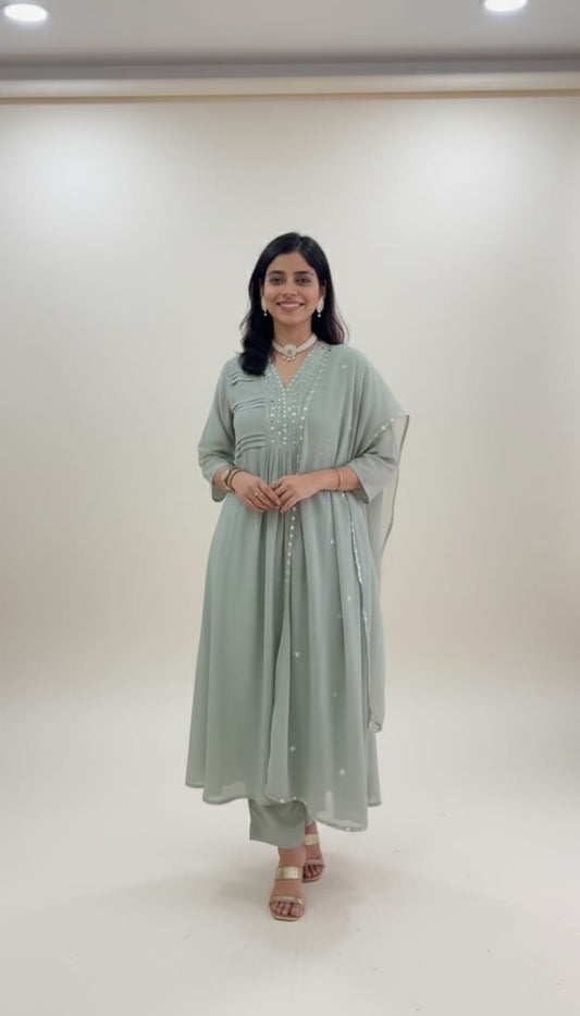 Elegant Mint Green Kurta Set with Mirror Work Detailing
