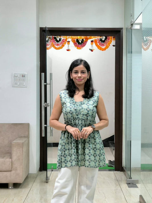 Mint Green Sleeveless Cotton Peplum Top