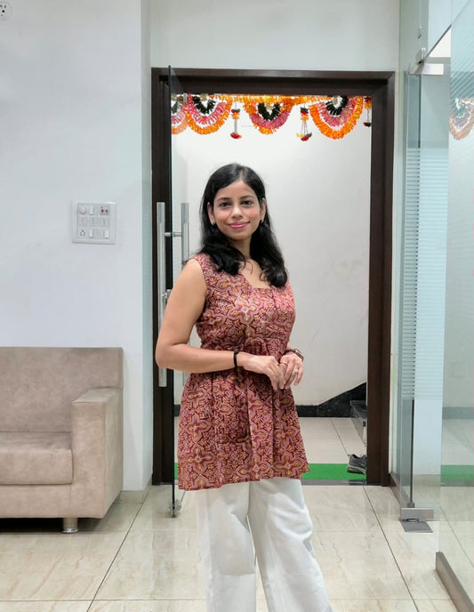 Rust Red Sleeveless Cotton Peplum Top